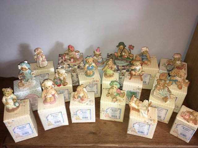 Preview of the first image of Vintage cherished teddies in original boxes.