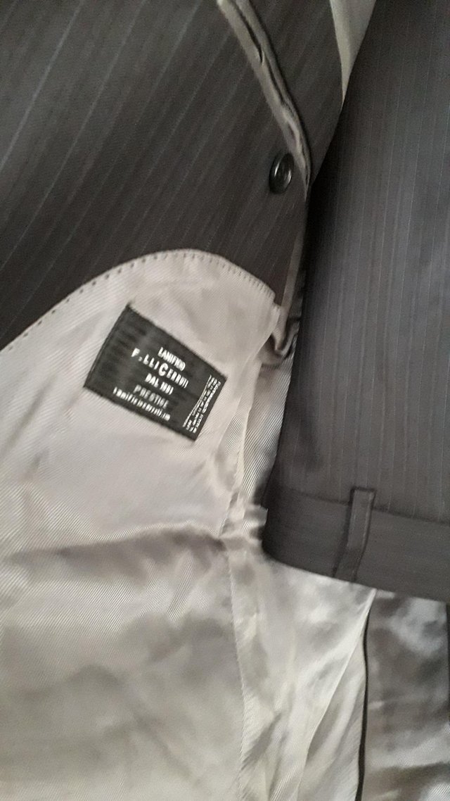 Preview of the first image of Mens suit.
