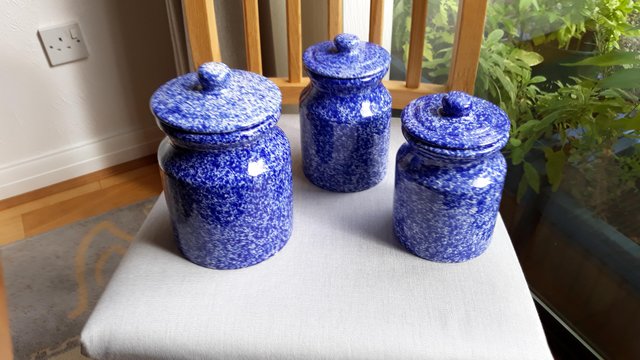 Preview of the first image of Blue pottery storage jars.