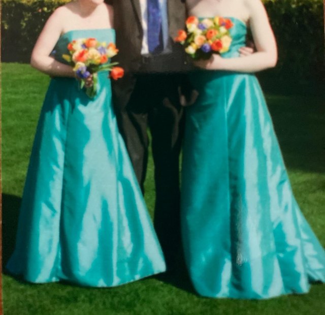 Preview of the first image of 2 Teal, taffeta Bridesmaid dresses.
