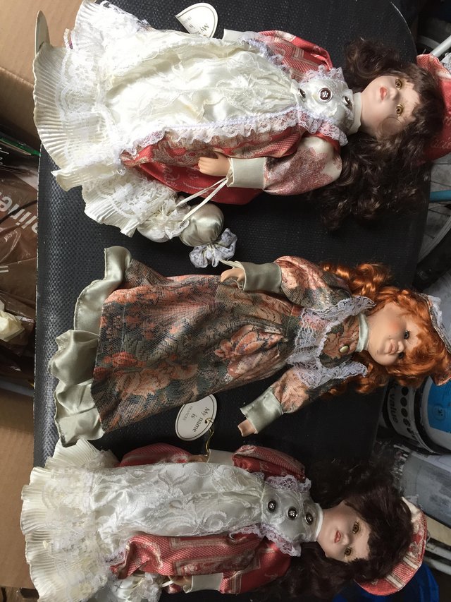Preview of the first image of Three porcelain dolls.