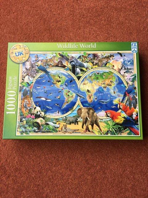 Preview of the first image of SCHMID 1000 PIECE JIGSAW PUZZLE-WILDLIFE WORLD.