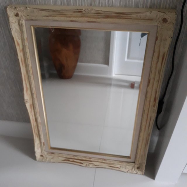 Preview of the first image of MIRROR IN CARVED WOOD with bevelled glass. Shabby chic..