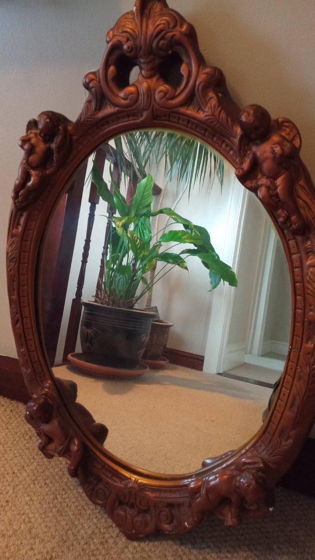 Image 3 of Oval Cherub mirror in gold dated from the 1970's