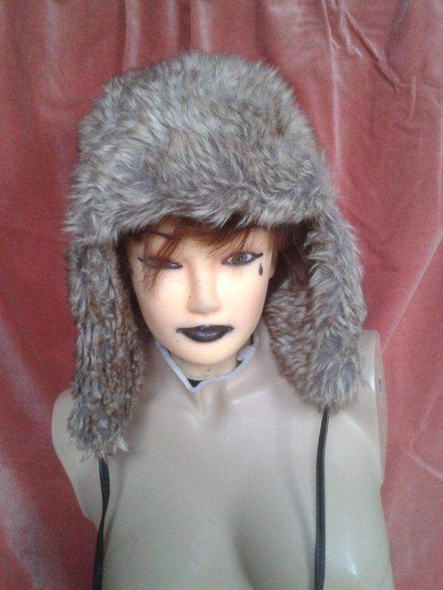 Preview of the first image of New Arctic Snow Russian faux fur quilted lined Trappers hat.