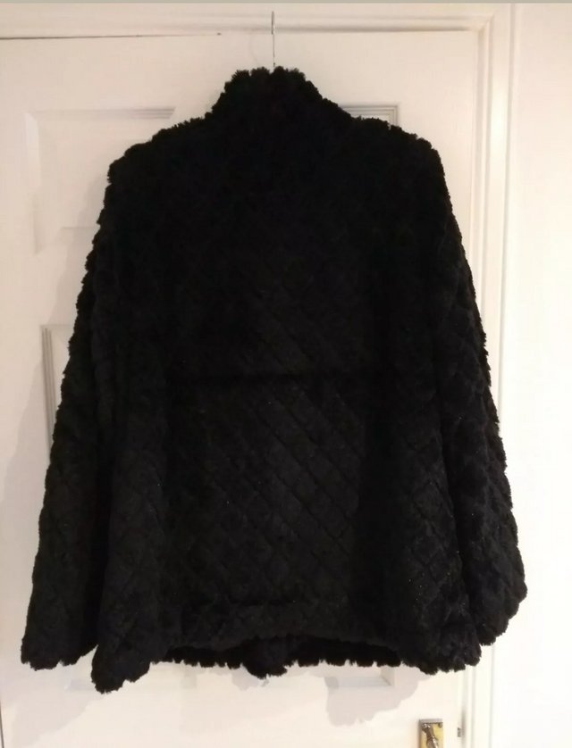Preview of the first image of Dennis Basso Black Oversized Faux Fur Jacket M.
