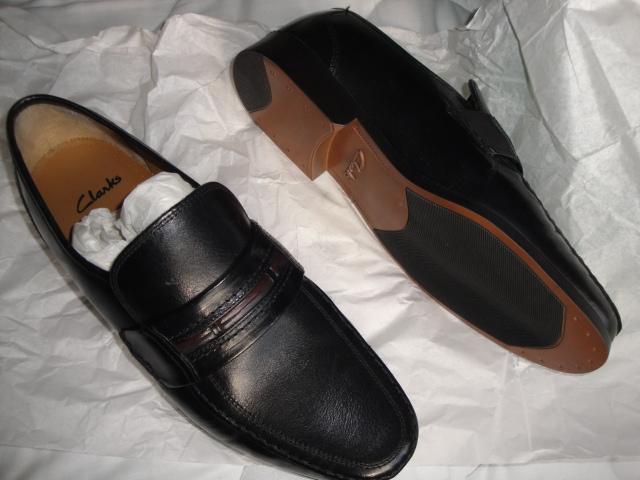 Preview of the first image of Clarks Black Slip-on Shoes 10.5 H. New. (C289).