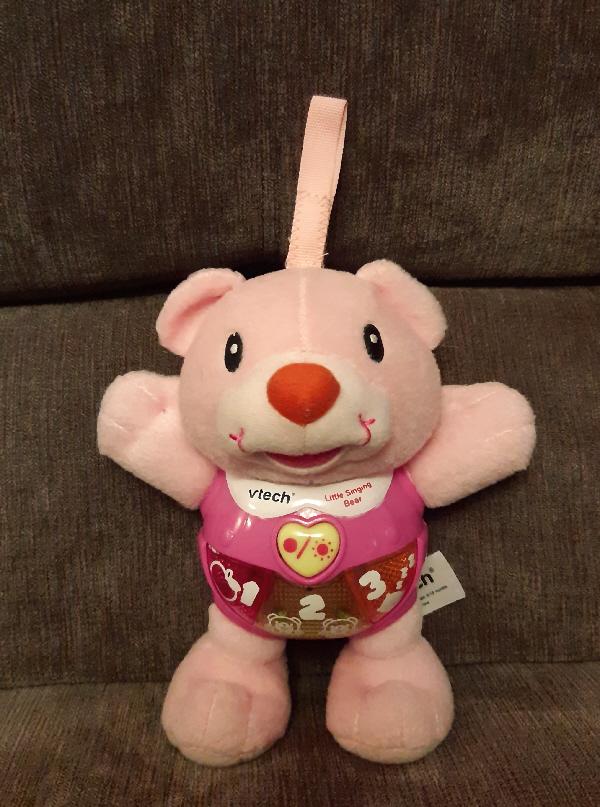 Preview of the first image of Vtech "Little Singing Bear" Babies Soft Toy In Pink.