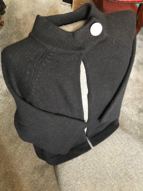 Preview of the first image of Ladies black 3/4 cardigan button top.