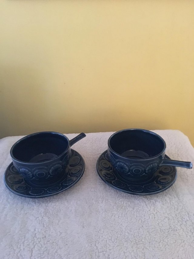 Preview of the first image of Tams Pottery Long handled Soup Bowls & Saucers.