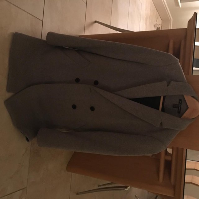 Preview of the first image of Grey wool double breasted coat.