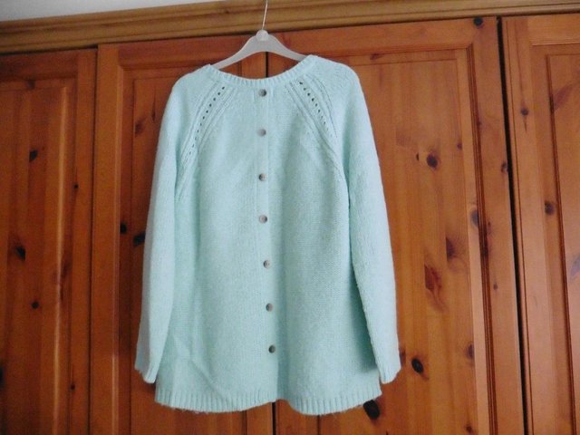 Preview of the first image of M&S button back jumper.