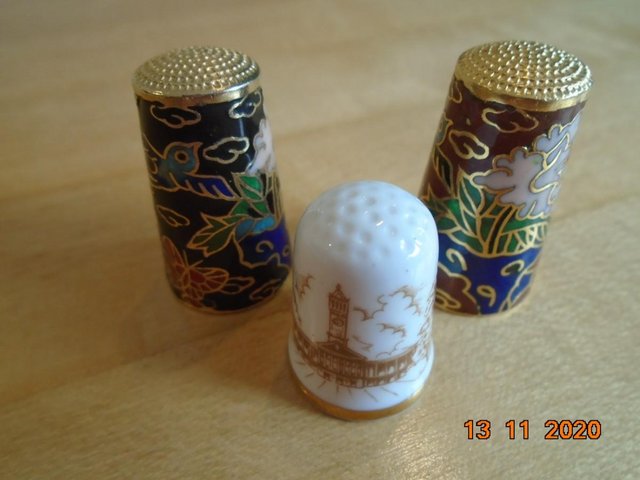 Preview of the first image of Three thimbles: two from Korea & one from Australia.