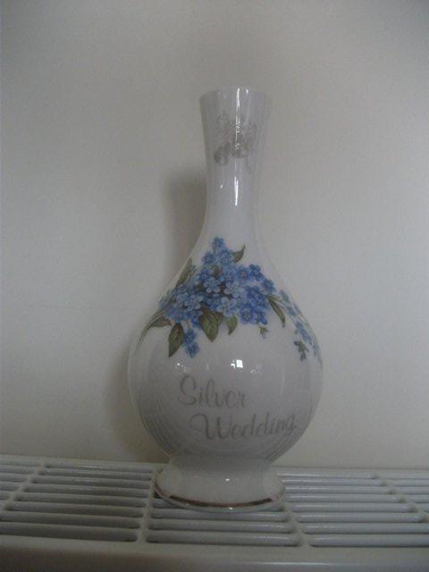 Preview of the first image of SILVER WEDDING VASE.