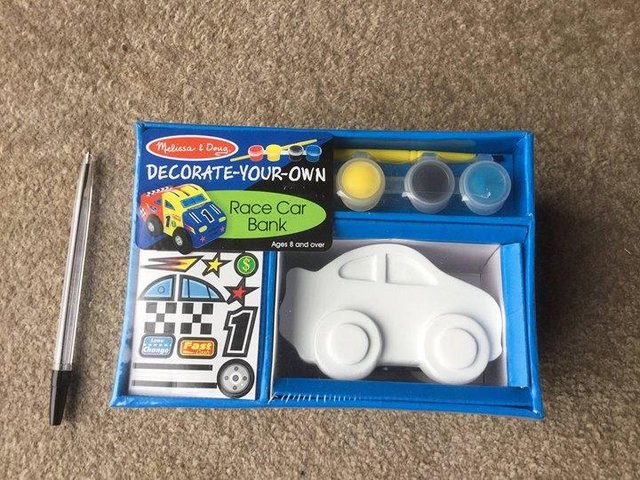 Preview of the first image of New Melissa and Doug Decorate your own race car piggy bank.