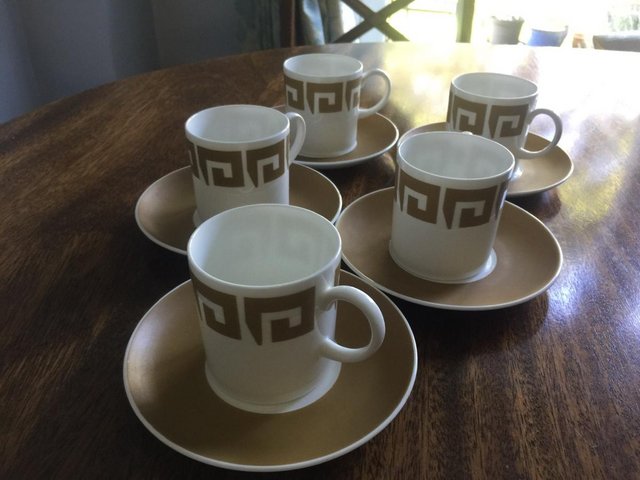 Preview of the first image of Susie Cooper Old Gold Keystone coffee cups and saucers.