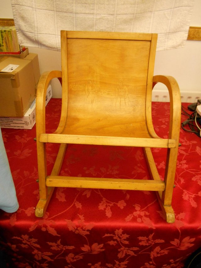 Preview of the first image of ANTIQUE / VINTAGE CHILD'S ROCKING CHAIR.