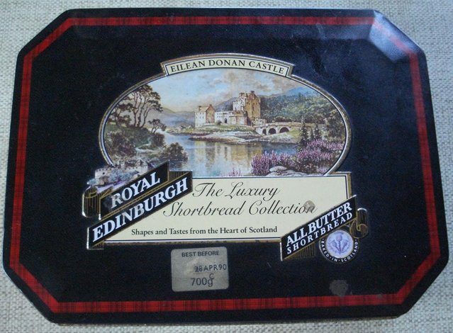Preview of the first image of VINTAGE SCOTTISH BISCUIT TIN OF EILEAN DONAN CASTLE SCOTLAND.