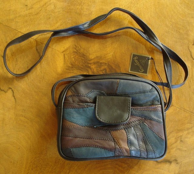 Preview of the first image of NEW GIRL’S BLACK & MULTI-COLOURED PATCHWORK LEATHER HANDBAG.