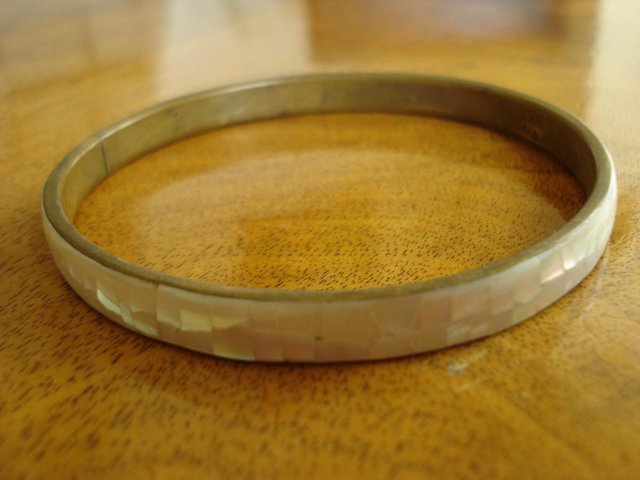Preview of the first image of ANTIQUE VINTAGE NARROW MOTHER OF PEARL ABALONESHELL BRACELET.