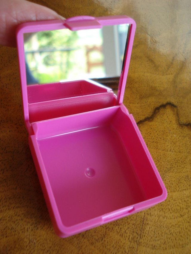 Preview of the first image of NEW PINK POCKET SIZE CONTACT LENS CASE BY ROHTO + MIRROR.