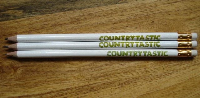 Preview of the first image of NEW Set of 3 - COUNTRYTASTIC Wooden Pencils with Erasers.
