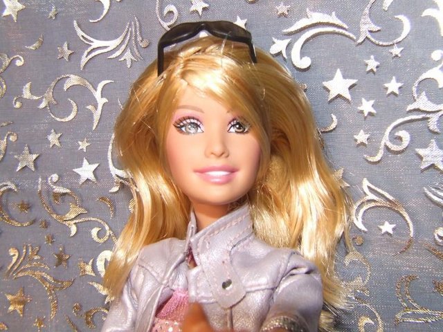 Preview of the first image of Barbie collectible High School Musical Sharpay Talking Doll.