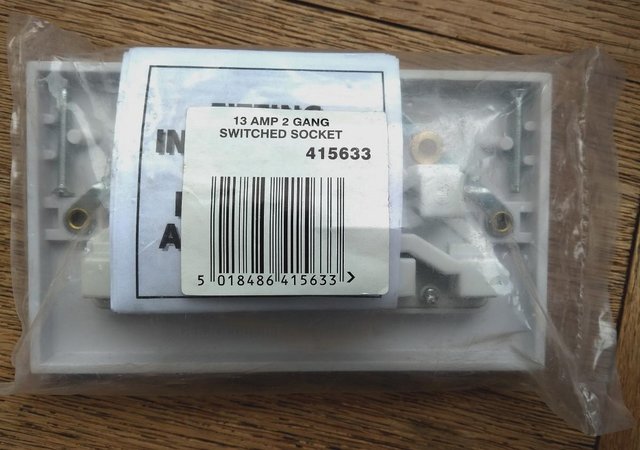 Preview of the first image of 13 AMP 2 GANG SWITCHED SOCKET WHITE, NEW, UNOPENED.