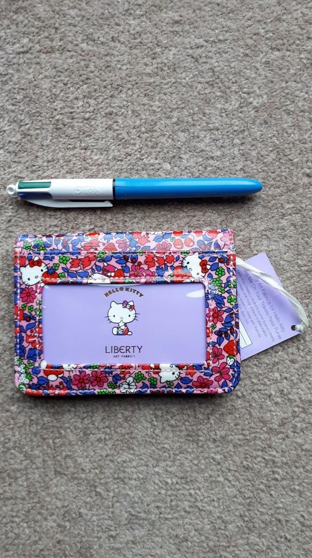 Preview of the first image of Hello Kitty Liberty Travel pass purse wallet BRAND NEW.