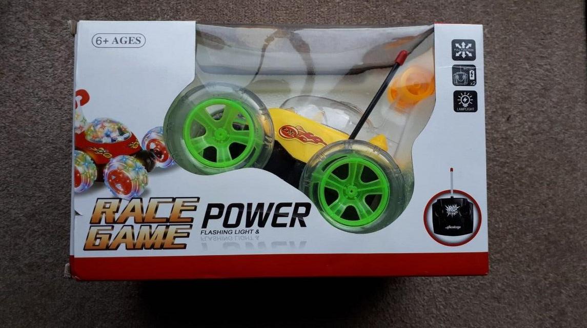 Preview of the first image of Race Game Light Up Remote control car BNIB.