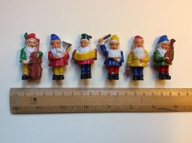Preview of the first image of Six Tiny Christmas Gnome Carollers Cake Decorations.