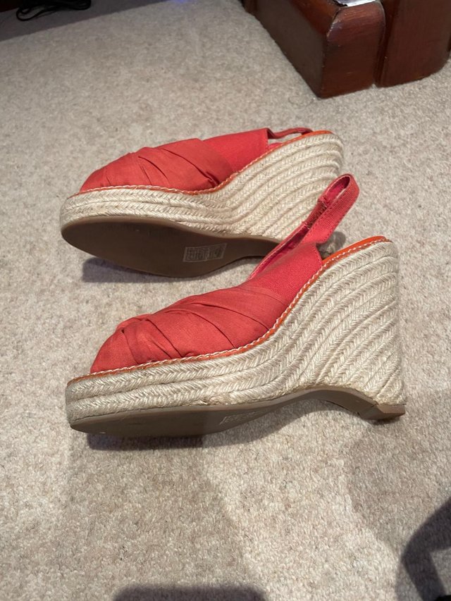Preview of the first image of Vintage Orange Monsoon Heeled rope wedges.