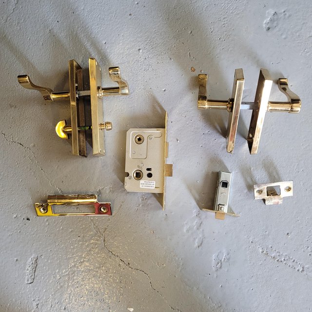 Preview of the first image of 17 x Brass effect Door Handles and fittings.