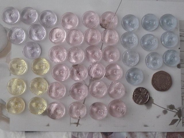 Preview of the first image of 45 x attractive pastel buttons, glass/swirl effect.