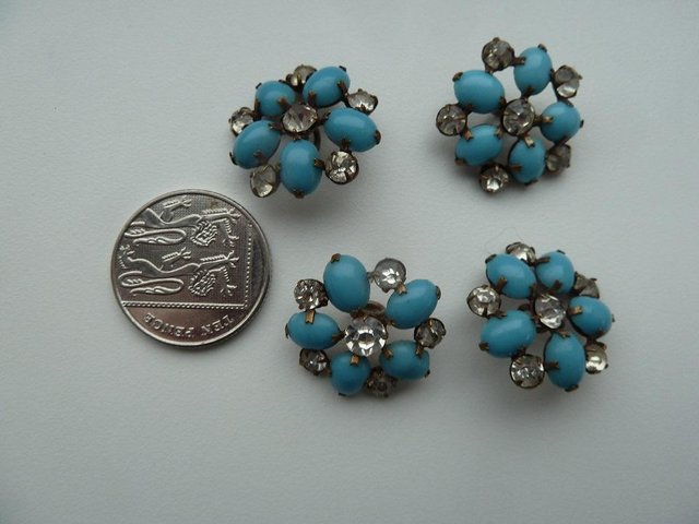 Preview of the first image of 4 decorative brooch style vintage buttons - turquoise.