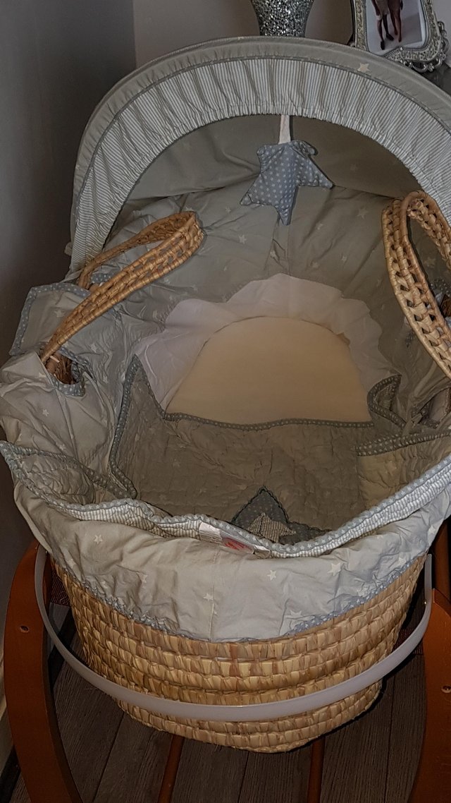 Preview of the first image of Mammas and Pappas moses basket and rocking stand.