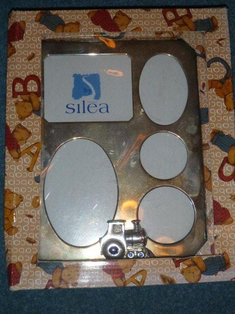 Preview of the first image of Silver photograph frame with train: New in box. Genuine..