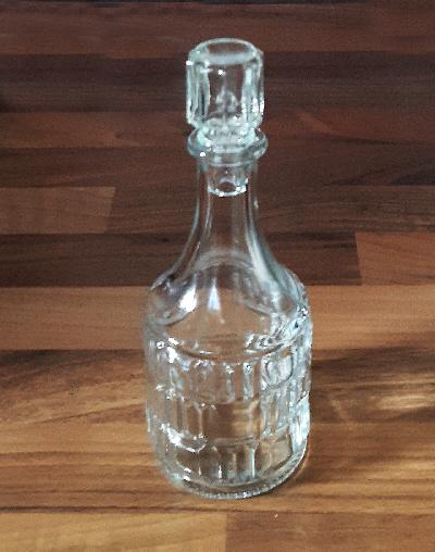 Preview of the first image of Small Vintage Glass Oil Bottle With Stopper.