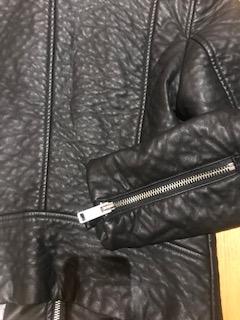 Preview of the first image of Women Black leather jacket size small.