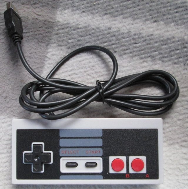 Preview of the first image of Retro NES style game controller (Incl P&P).