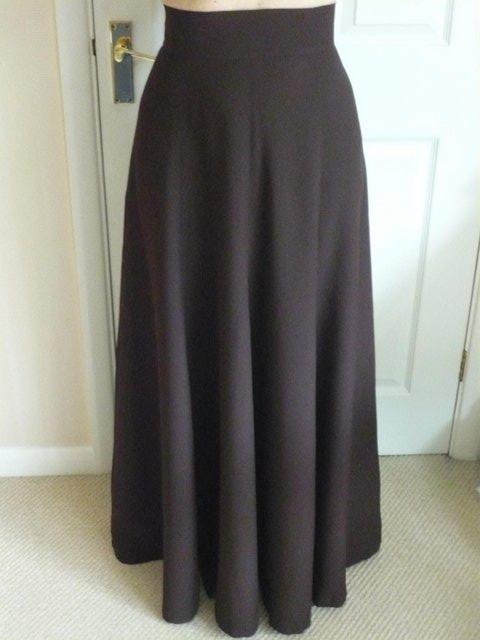 Preview of the first image of Skirt: vintage, long, dark brown, crepe - early 1970's.