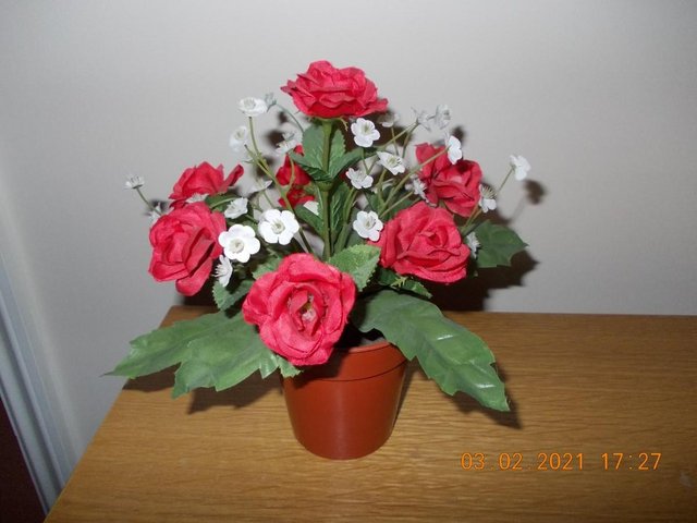 Preview of the first image of Silk Flower Red Rose Plant in a Pot.