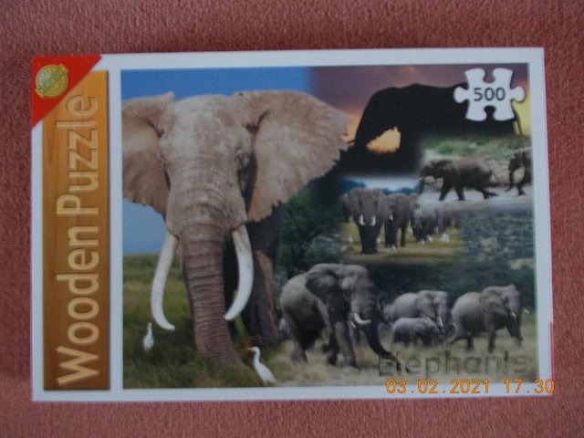 Preview of the first image of Wooden Jigsaw Puzzle - Elephants.