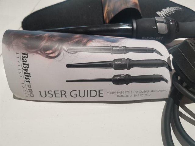 Preview of the first image of Babyliss Pro Black Conical Thermal Wand 25-13mm.