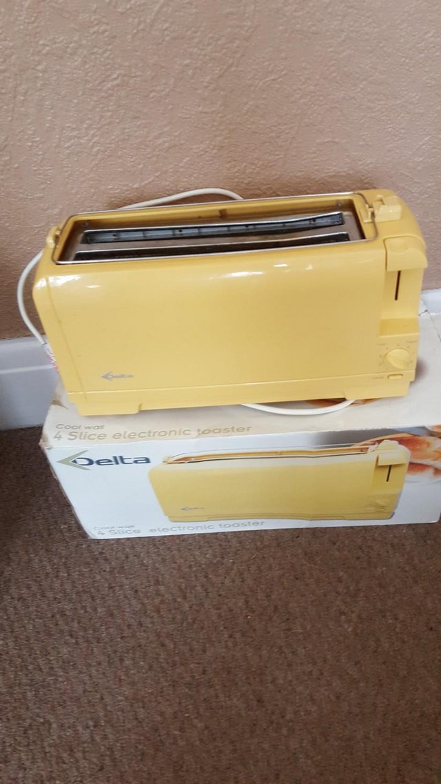 Preview of the first image of Yellow toaster.