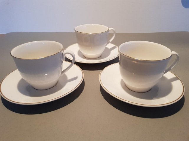 Preview of the first image of Royal Doulton Imagination Cups and Saucers x 3.