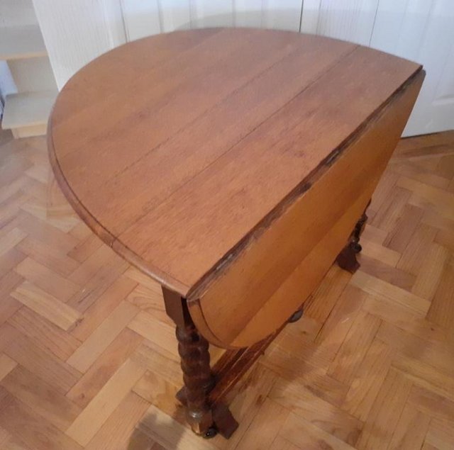 Preview of the first image of Vintage gateleg drop leaf table.