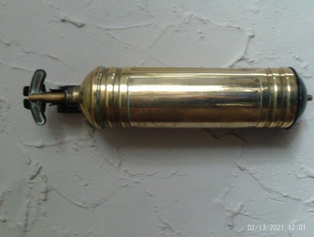 Preview of the first image of brass fire extinguisher.