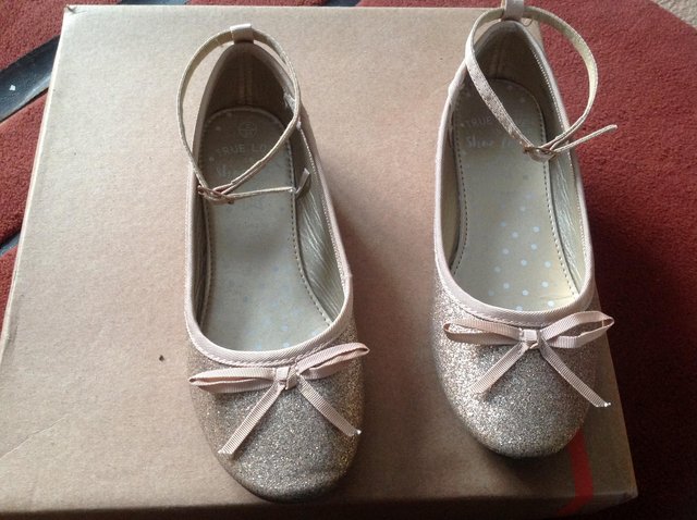 Preview of the first image of Girl's gold sparkly shoes Size 2 (Older girl's).