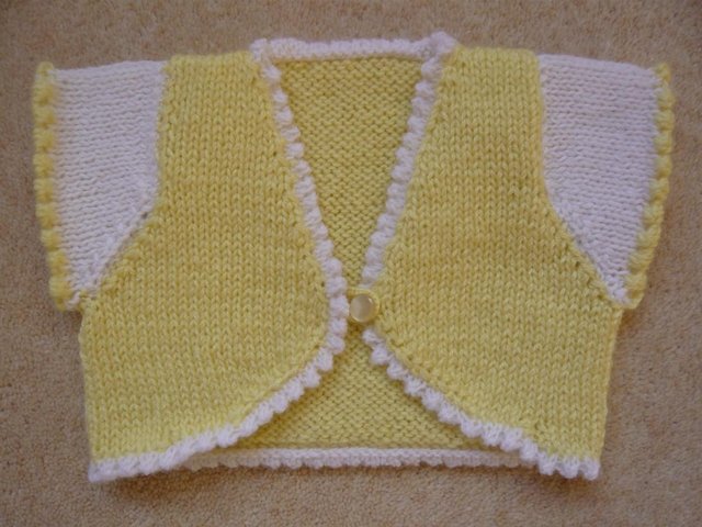 Preview of the first image of Bolero - baby girl, brand new, hand knitted.